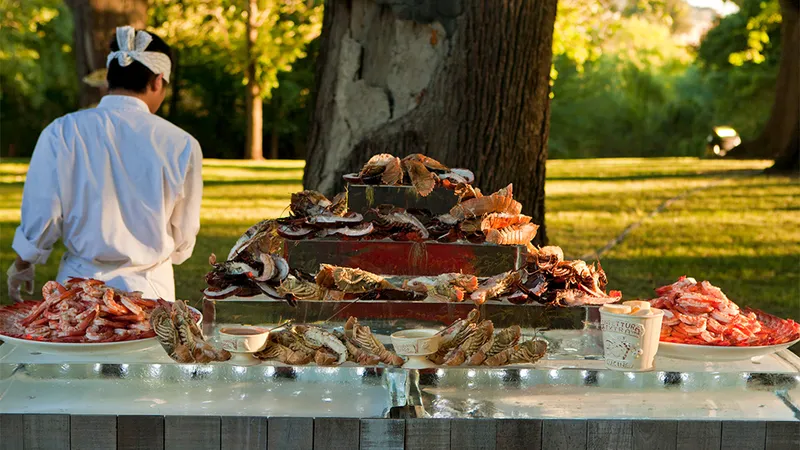 Outdoor seafood station with oysters and crustacea on a lawn at Stix Farm by PEARL