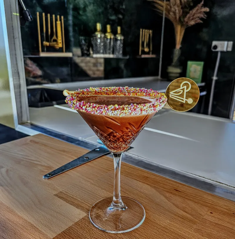 The Tall Pour photo